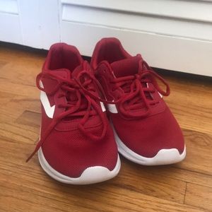 New red tennis shoes, worn once